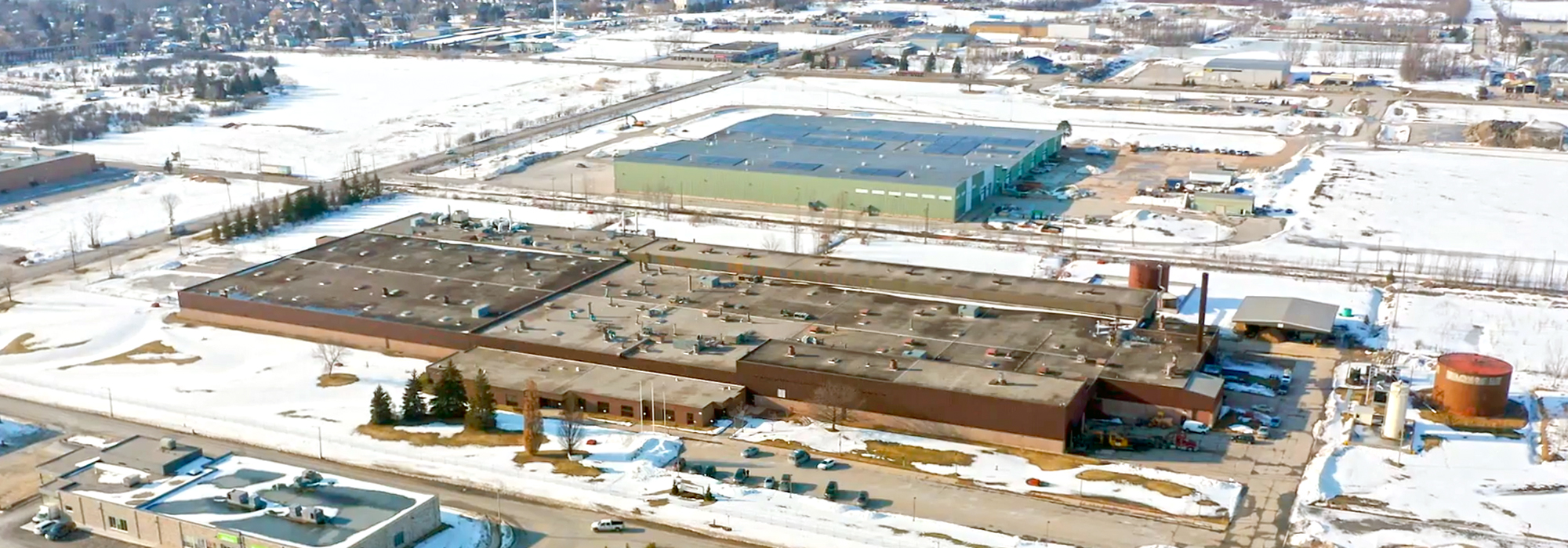Drone shot of Hydrogen Optimized's facility in Owen Sound, Ontario during the winter.